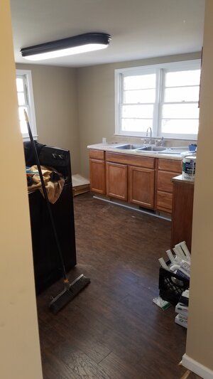 Tree damaged and remodeled home