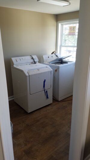 Tree damaged and remodeled home