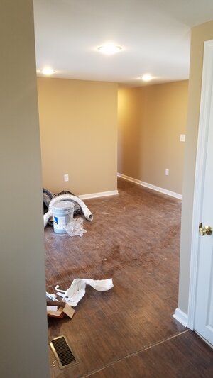 Tree damaged and remodeled home