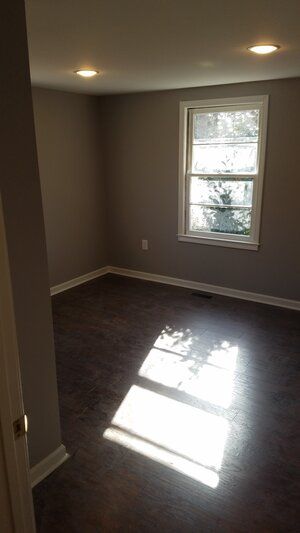 Tree damaged and remodeled home