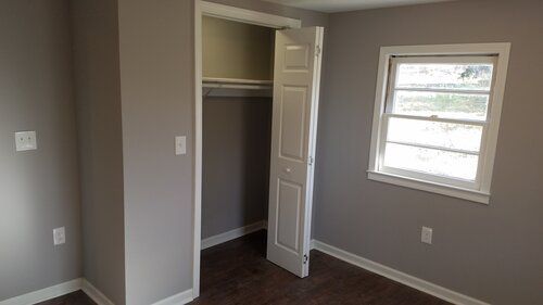 Tree damaged and remodeled home