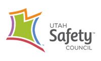 Logo of the Utah Safety Council: colorful geometric shape with text 