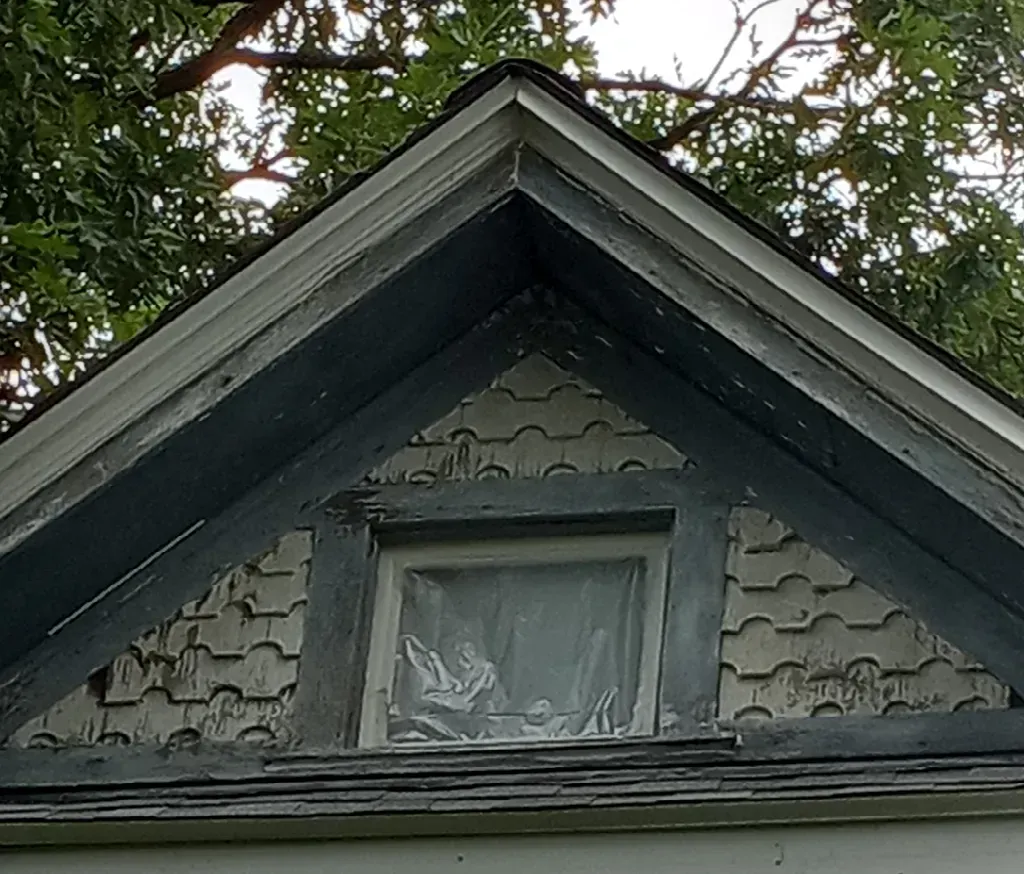 Before photo of the roof of a house.