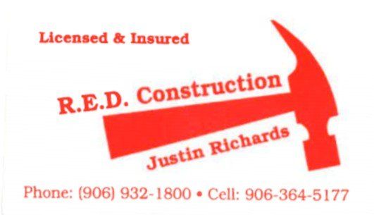 Business card for R.E.D. Construction with a red hammer graphic, contact information, and 