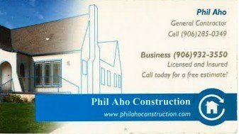 Business card for Phil Aho Construction. Features a house graphic, phone numbers, and website.