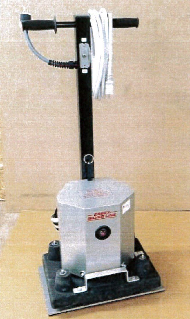 Floor sander with a rectangular base, silver motor, and black handle. White cord coiled on the handle.