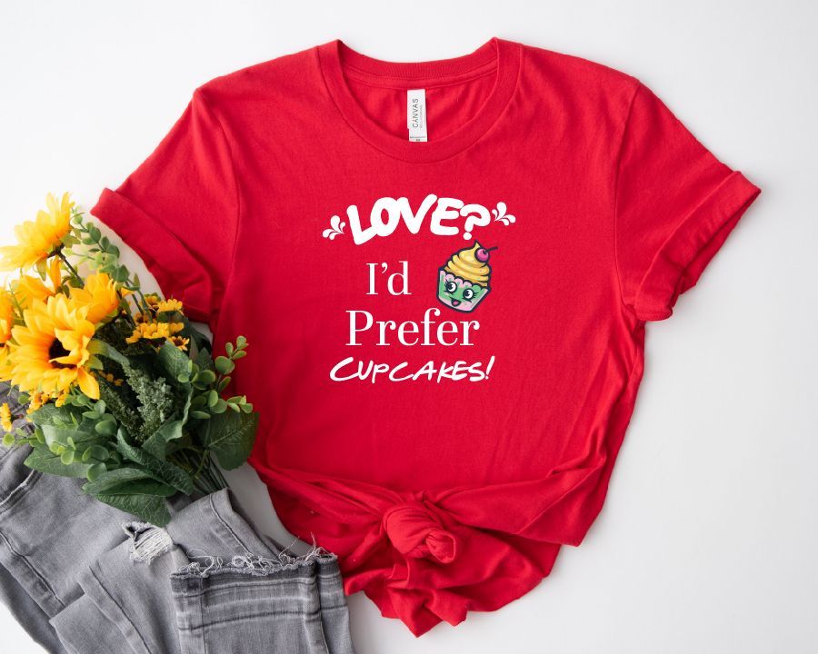 A red t-shirt that says love i 'd prefer cupcakes