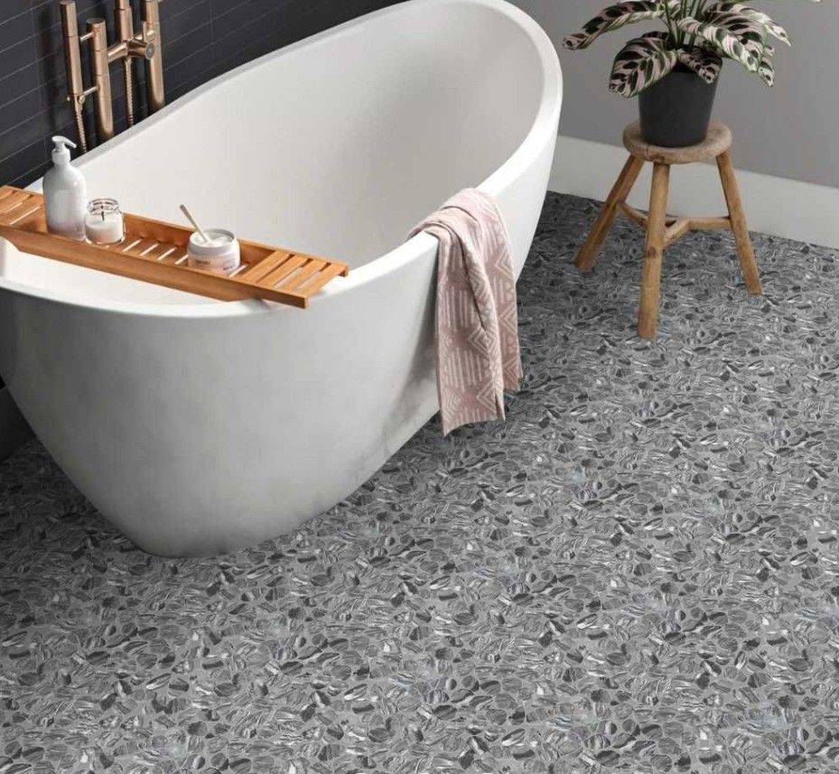 An aerial view of a kitchen with a table and chairs