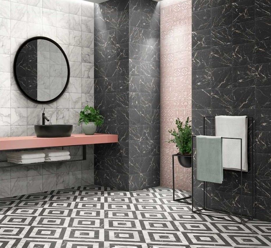 A close up of a mosaic tile wall