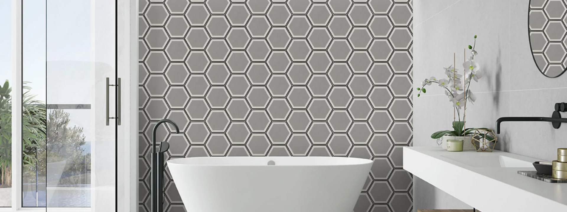 A bathroom with a bathtub , sink and mirror.