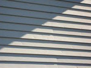 Aluminum siding dents