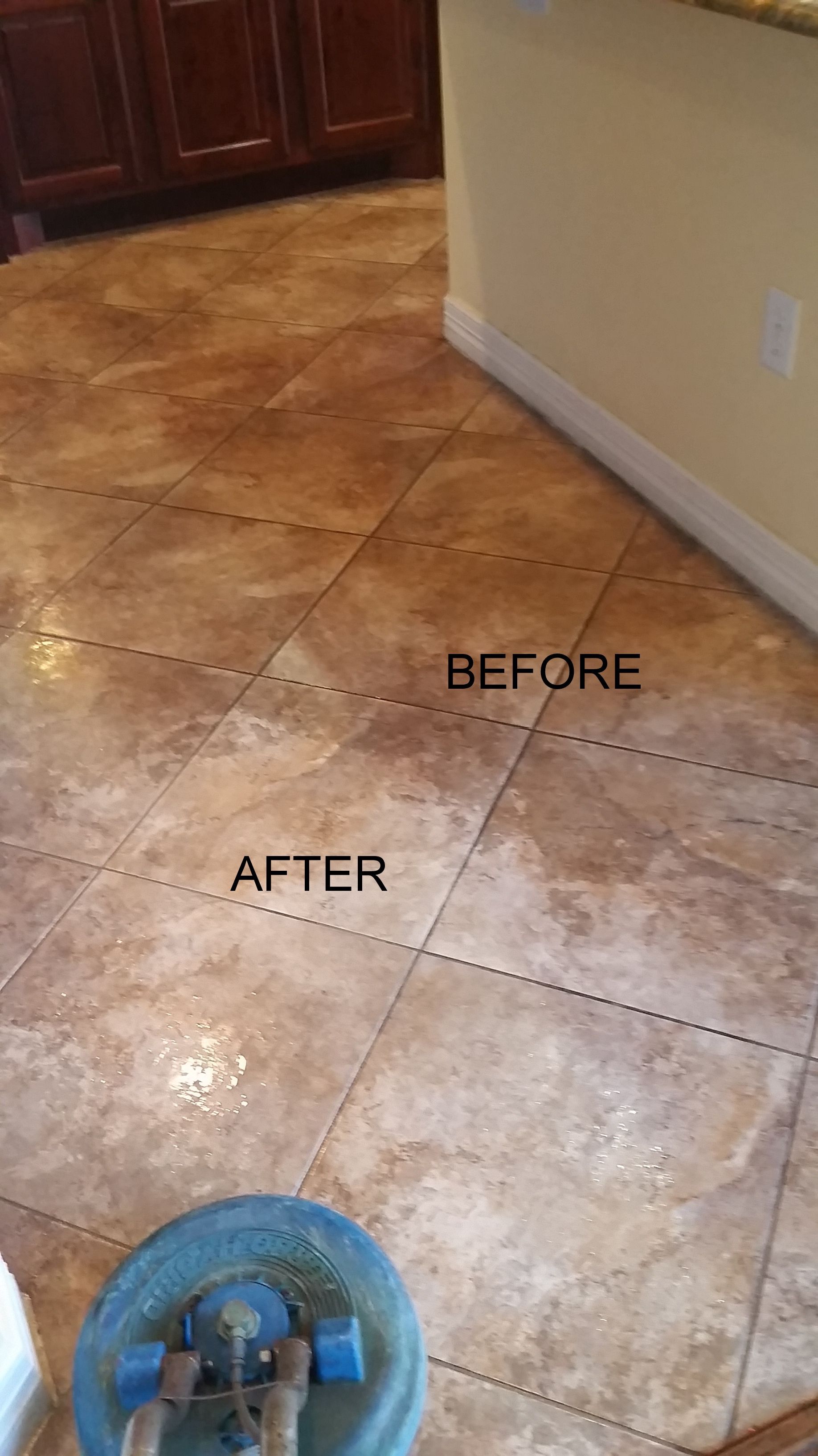 Floor tile cleaning in progress, with 