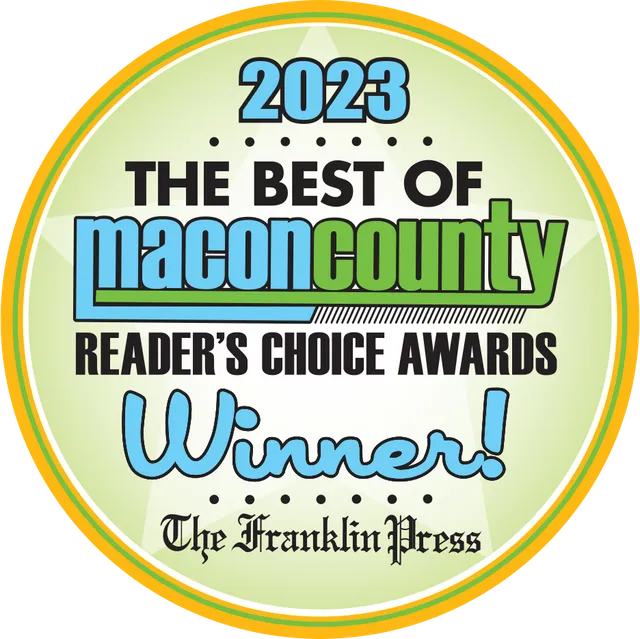 2023 Best of Macon County Reader's Choice Award winner badge; green, blue, and yellow colors.