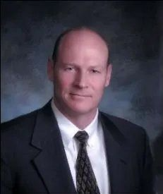 Photo of {{Team Member Name}}