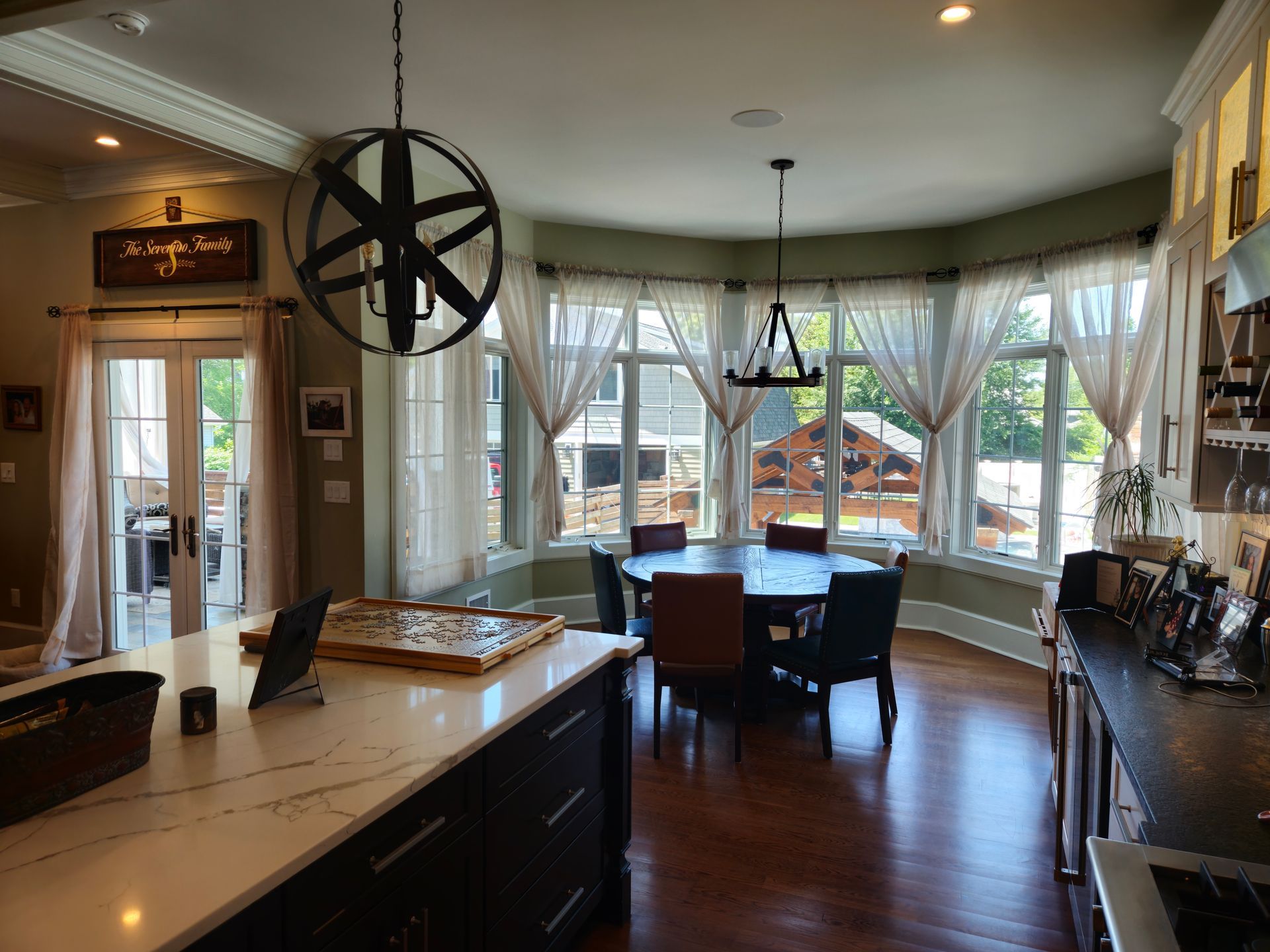 A kitchen with a table and chairs in it