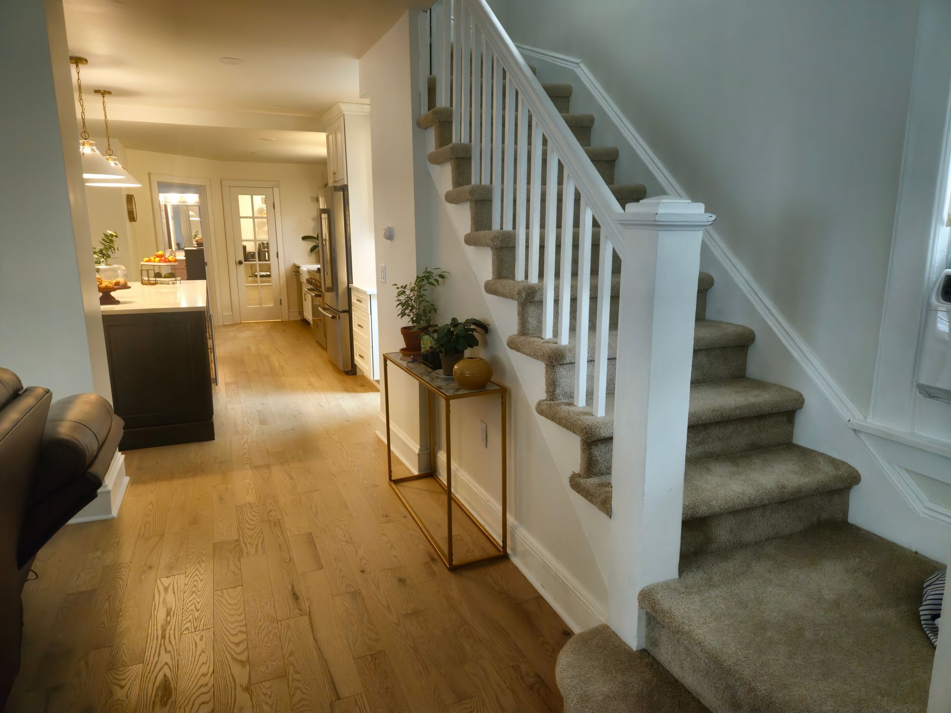 A staircase leading up to the second floor of a house