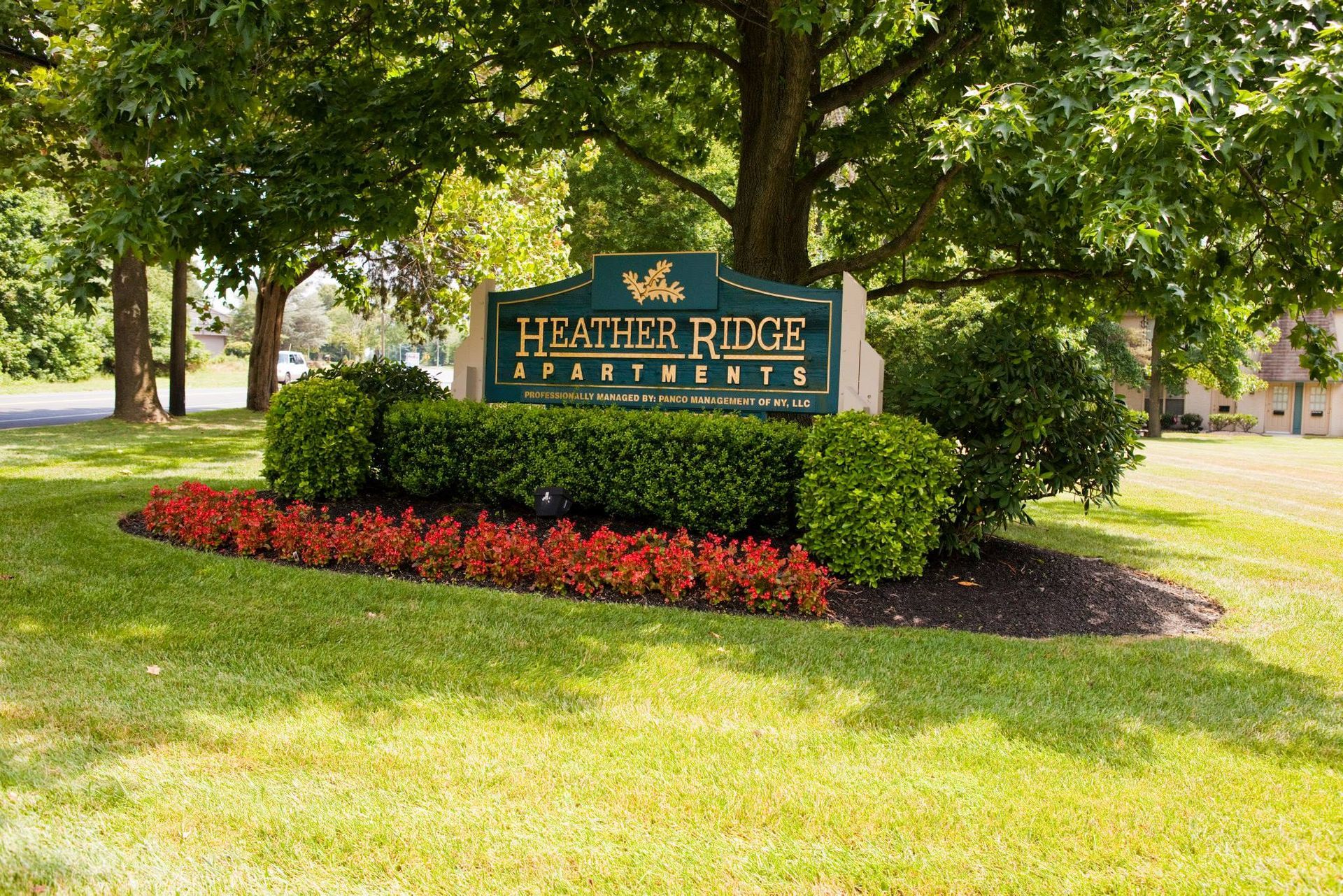 A sign for the heather ridge apartment complex