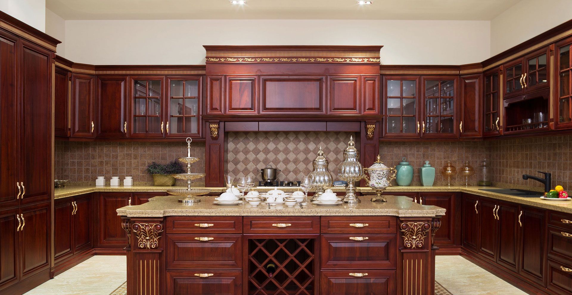 Elegant kitchen with dark wood cabinets, granite island, and decorative countertop accents