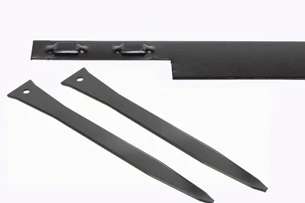 Black metal landscape edging with two anchoring stakes.
