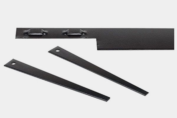 Black metal landscape edging and stakes against a light gray background.