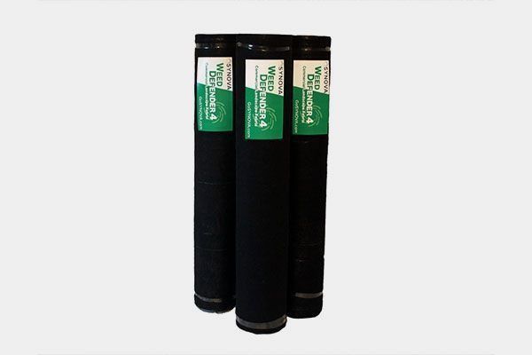 Three black cylindrical water filter cartridges with green and white labels.