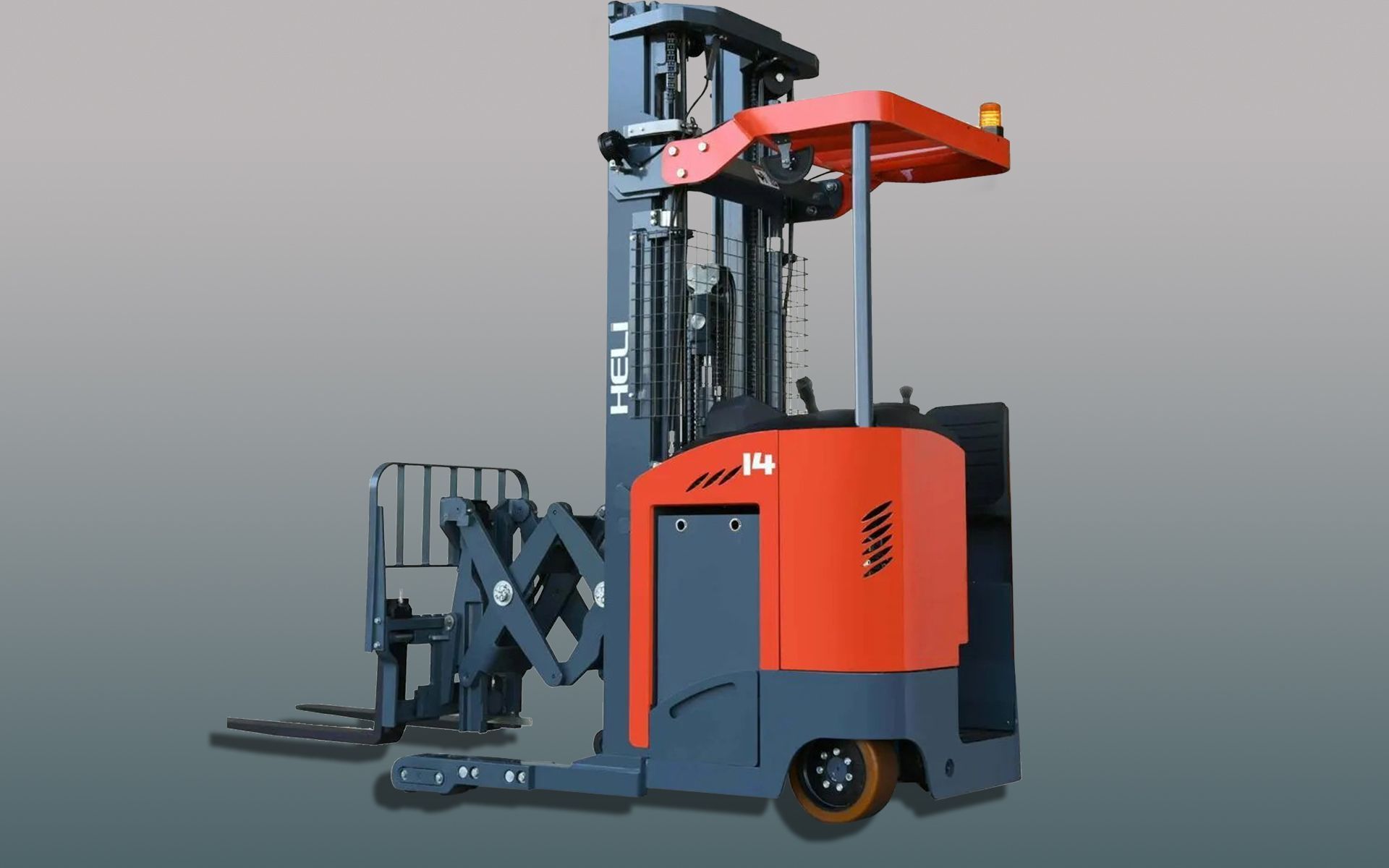 Red and gray stand-up forklift in a warehouse setting, with extended forks and lifted mast.