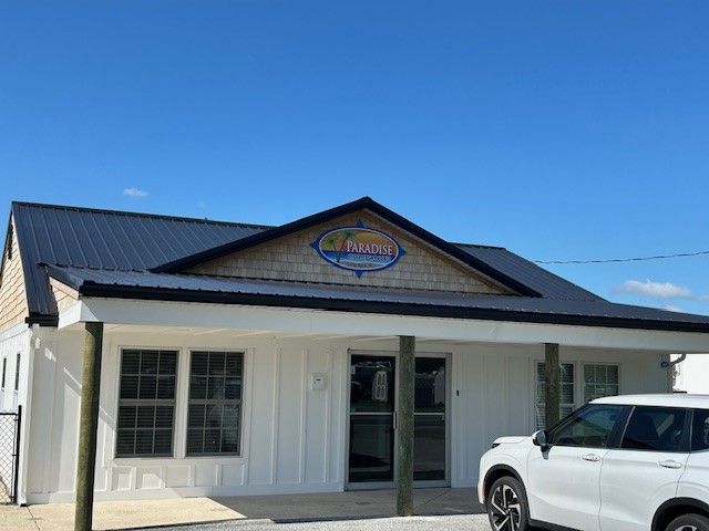 Black Metal Roof w/ Real Cedar Siding installed in Long Neck DE for the Paradise Companies