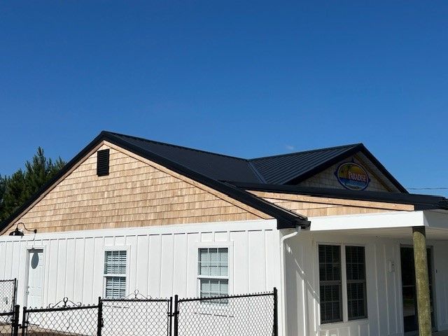 Black Metal Roof w/ Real Cedar Siding installed in Long Neck DE for the Paradise Companies