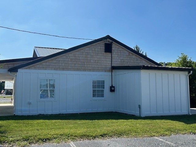 Black Metal Roof w/ Real Cedar Siding installed in Long Neck DE for the Paradise Companies