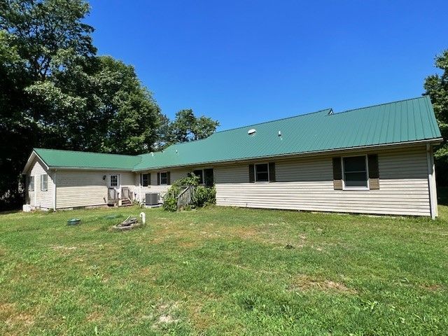 Laurel, DE- Hunter green metal roof