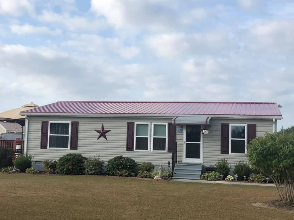 A mobile home with a star on the front of it