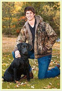 boy with dog and smiling