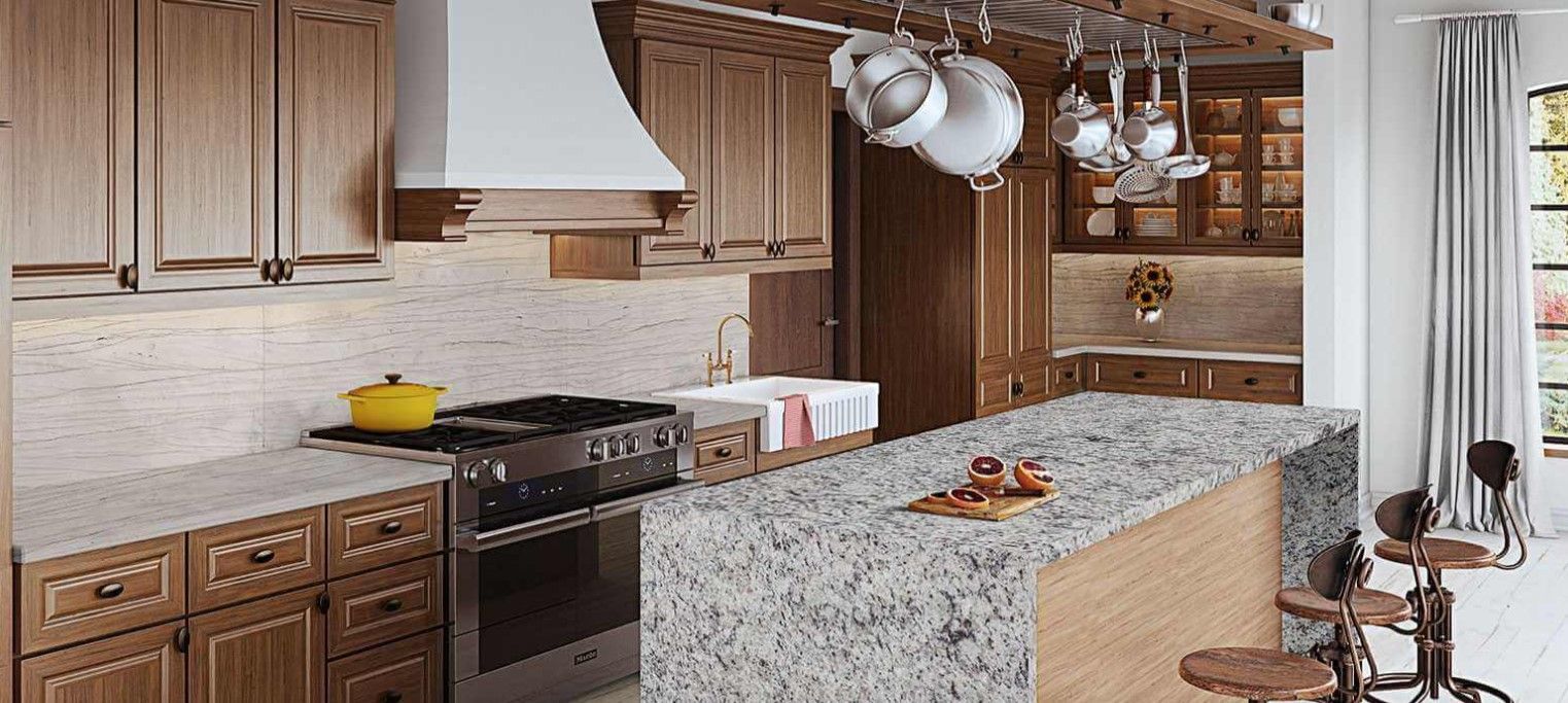 A kitchen with wooden cabinets and island, a stove, and hanging pots.