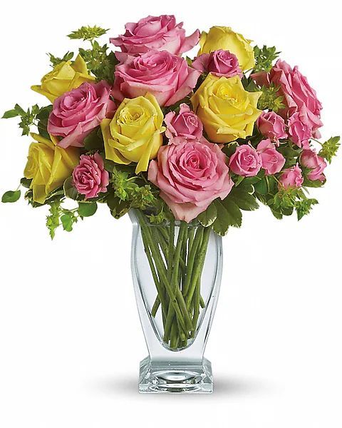 Bouquet of pink and yellow roses in a clear glass vase.
