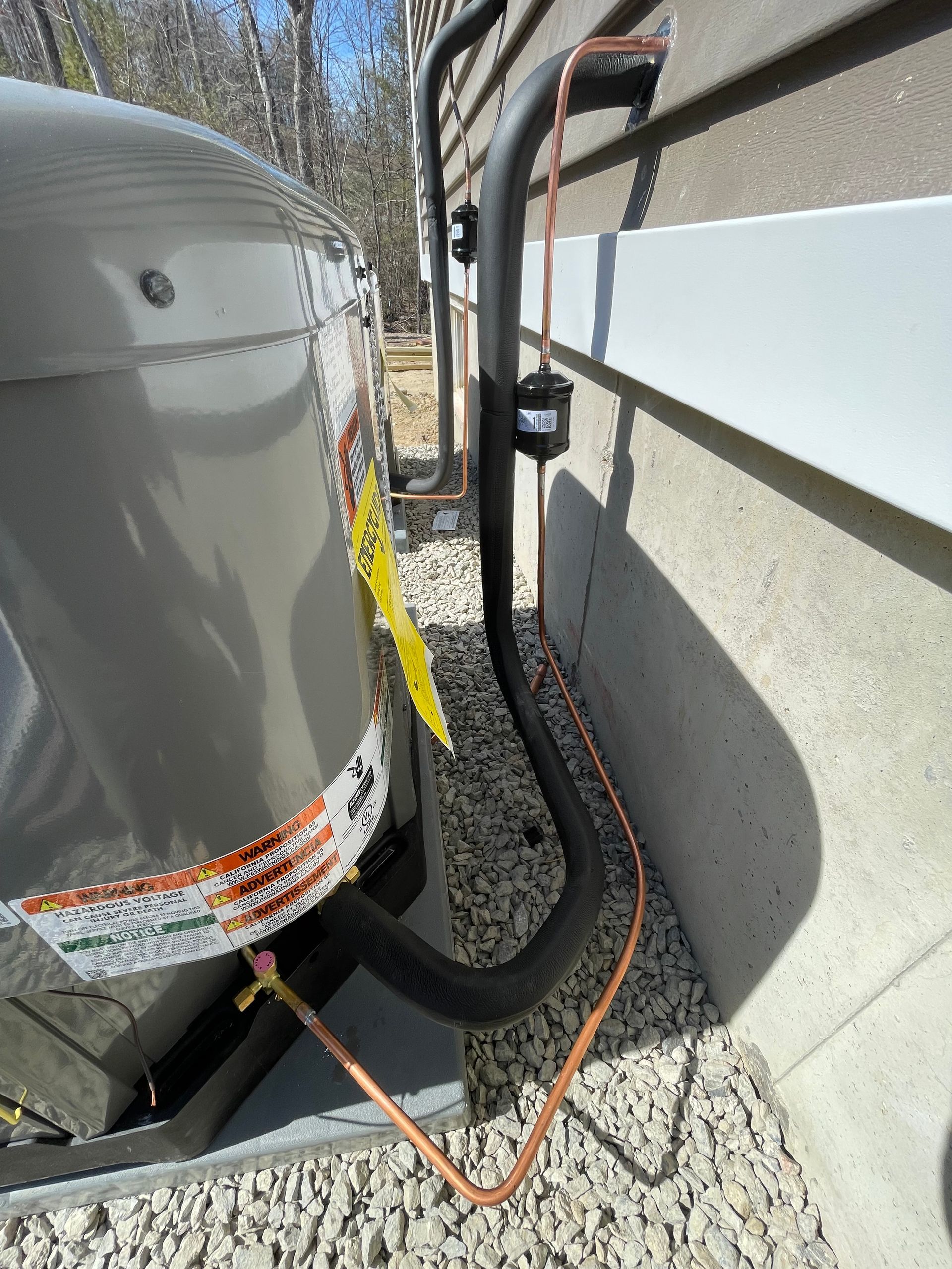 a hose is attached to the side of a house