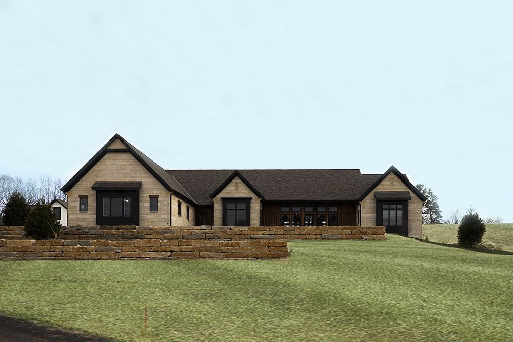 A large house is sitting on top of a lush green hillside.