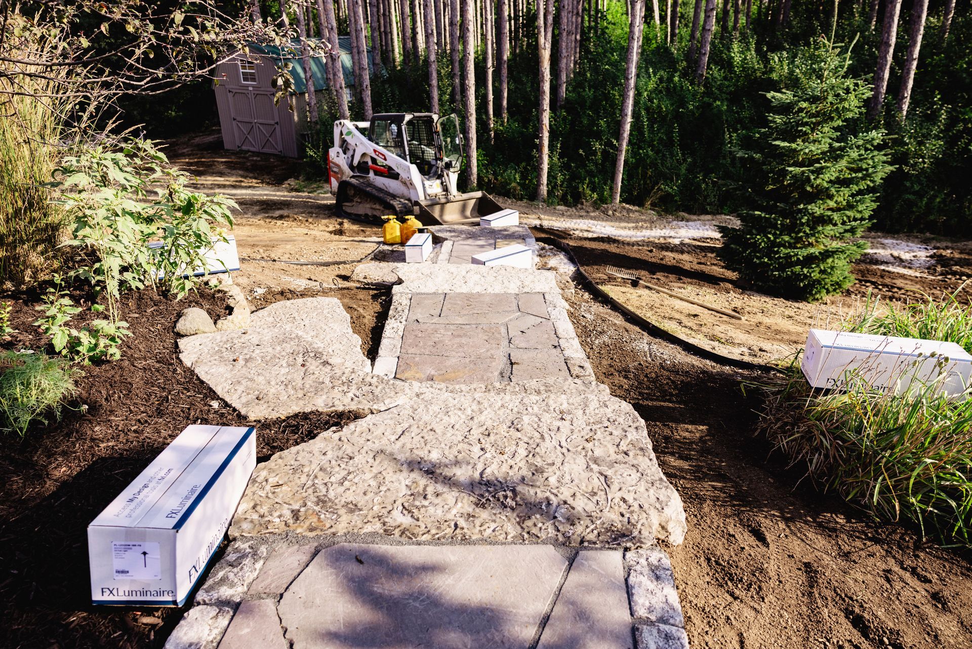 A walkway is being built in the middle of a forest.