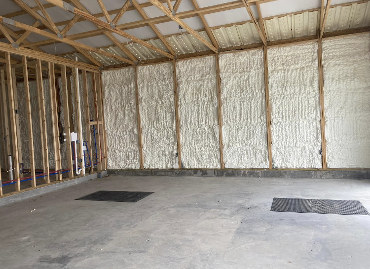 A large empty room with a lot of foam on the walls.