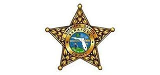 Gold sheriff’s badge with “Deputy Sheriff County” and a central Florida seal