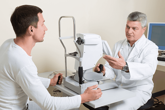 man meeting with eye doctor