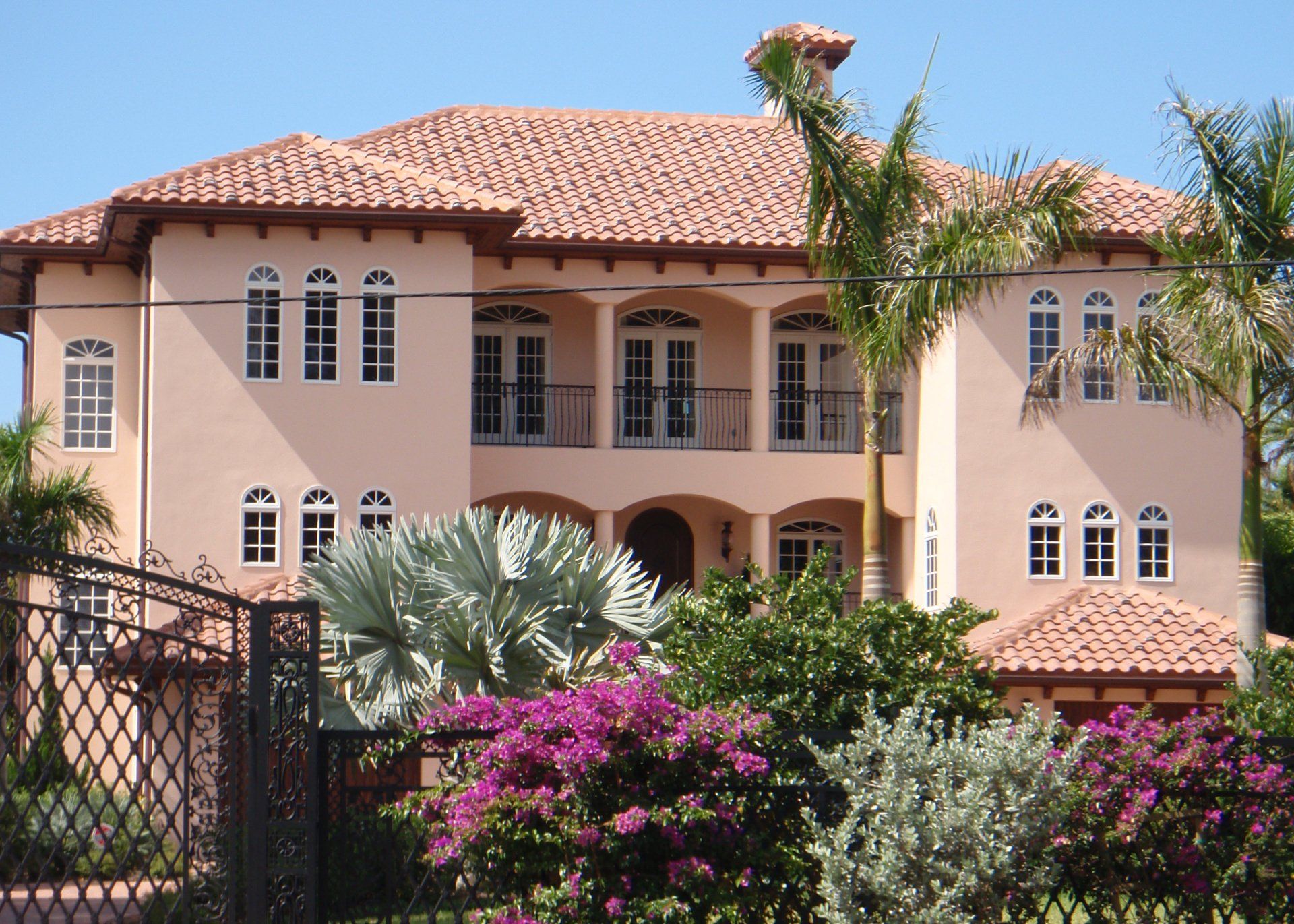 Pink House with Tile Roofing