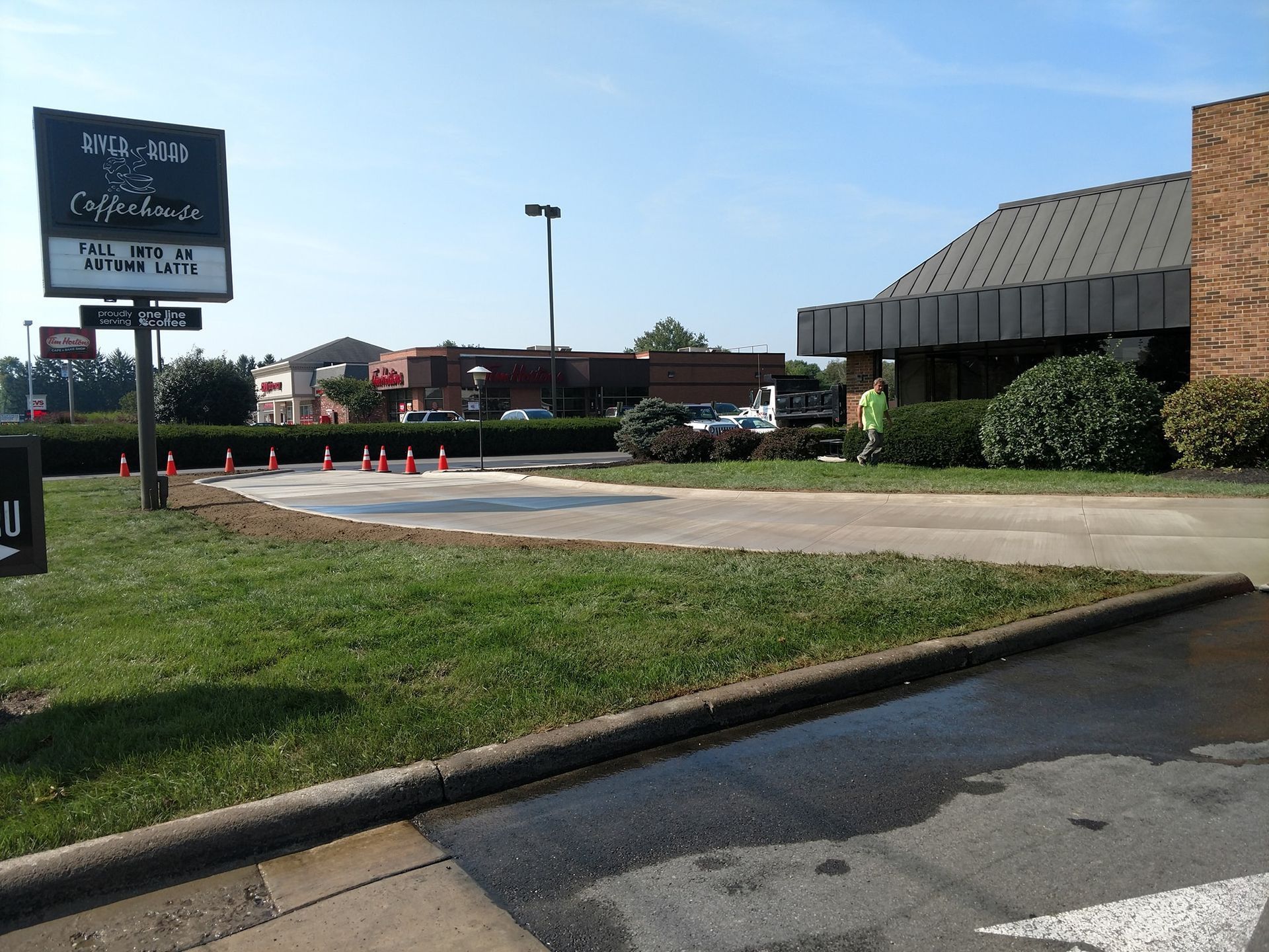A building with a sign in front of it that says coffeehouse