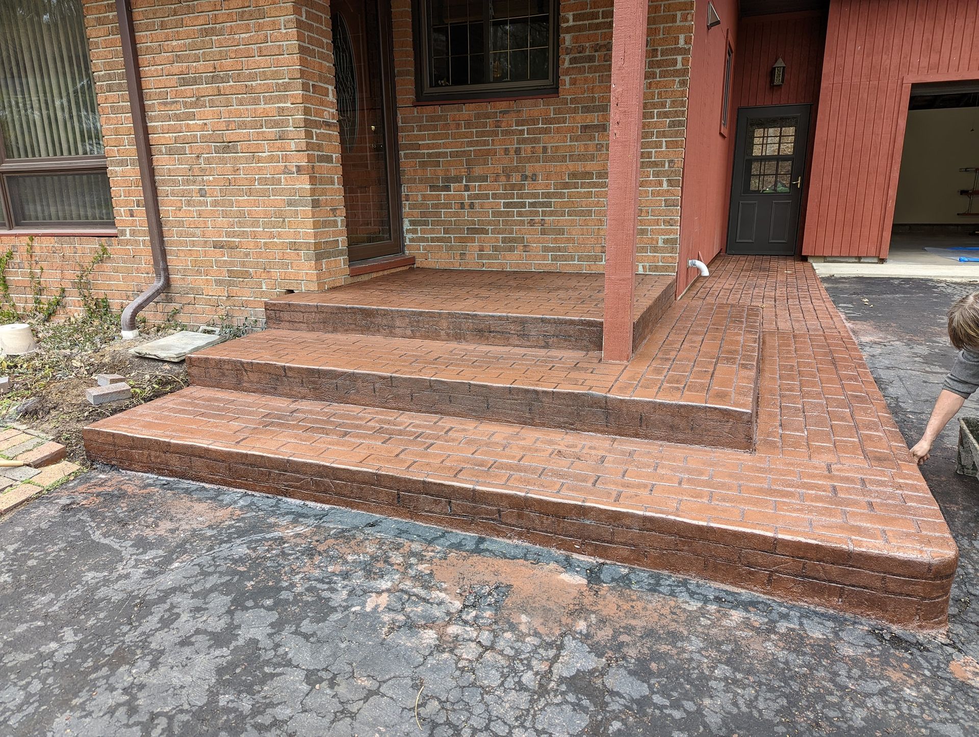 Brick stamped front steps and sidewalk
