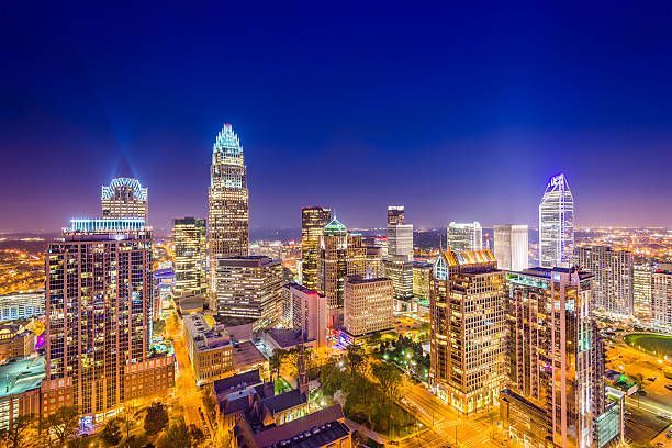 An aerial view of a city skyline at night.