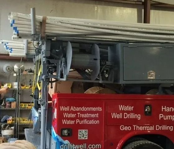 A red truck says well abandonments water treatment water purification and geo thermal drilling