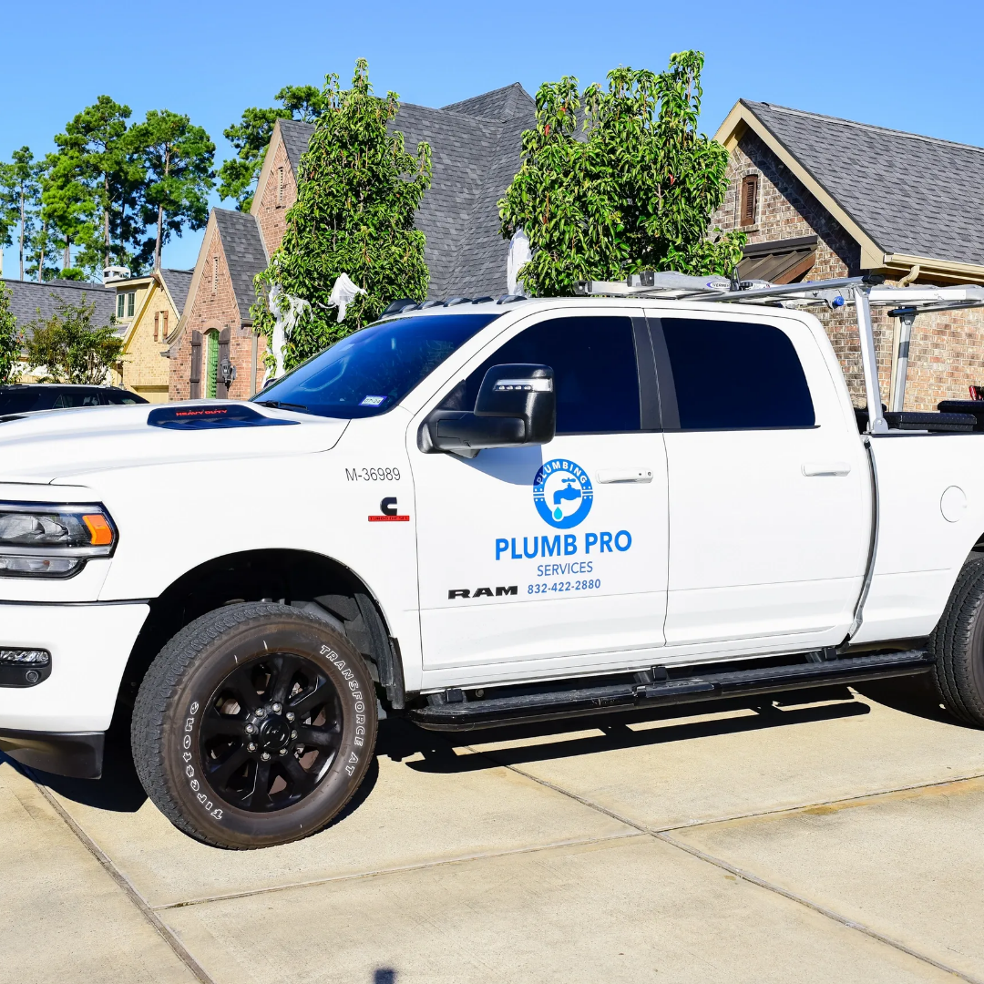 A white truck with the word plumb pro on the side