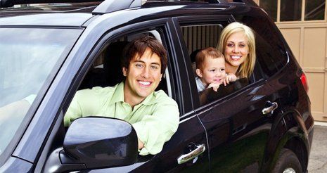 Learn More About Auto Insurance Family inside the car