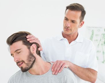 man massaging gently the customer's neck