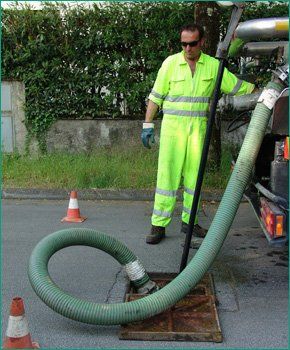 Man cleaning sewer