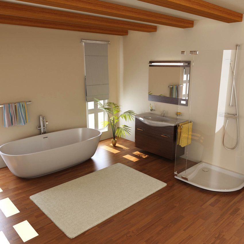 Bathroom with wooden floors, tub, shower, vanity, and window with beige walls and a rug.